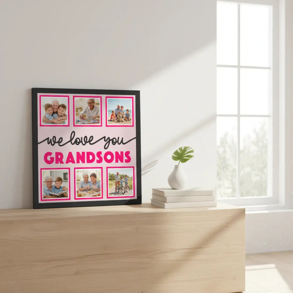 Decorative sign with 'we love you GRANDSONS' text and photo frames on a pink background