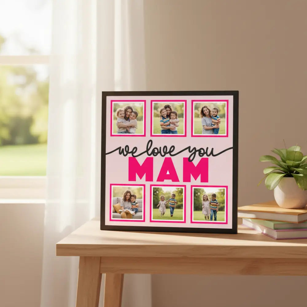Decorative sign with 'we love you MAM' text on a pink background