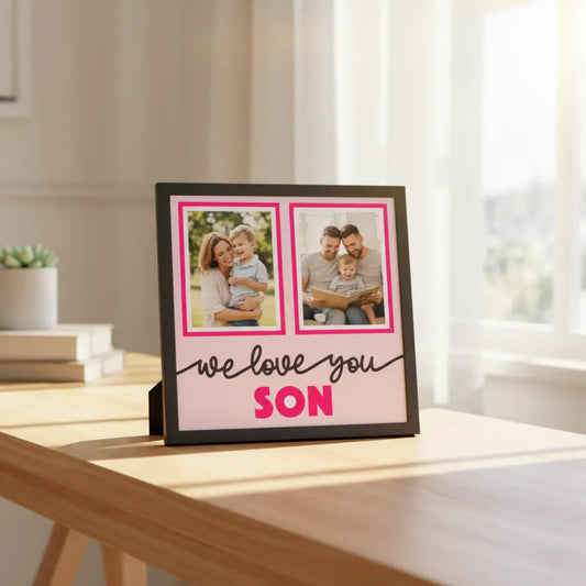 Decorative wall art with two photo frames and text 'we love you SON' on a pink background.