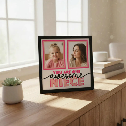 Framed print with 'You are one awesome niece' text and two blank photo frames.