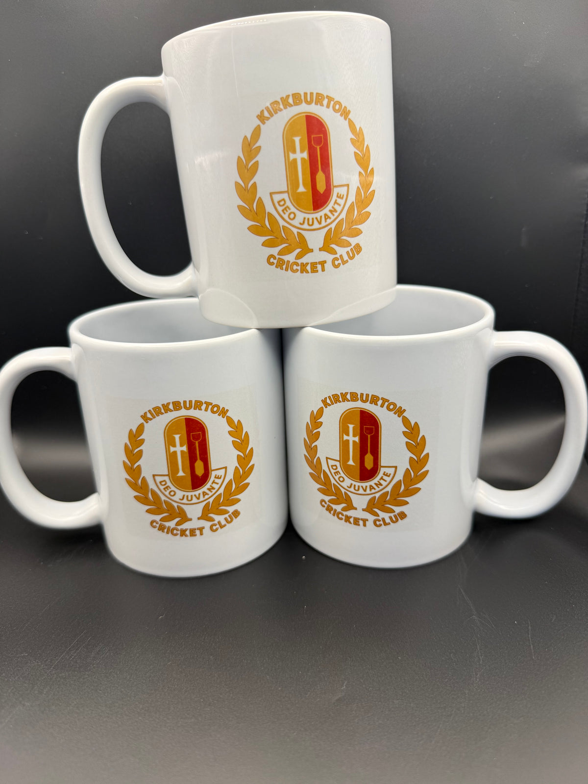 White personalised mugs with a crest design