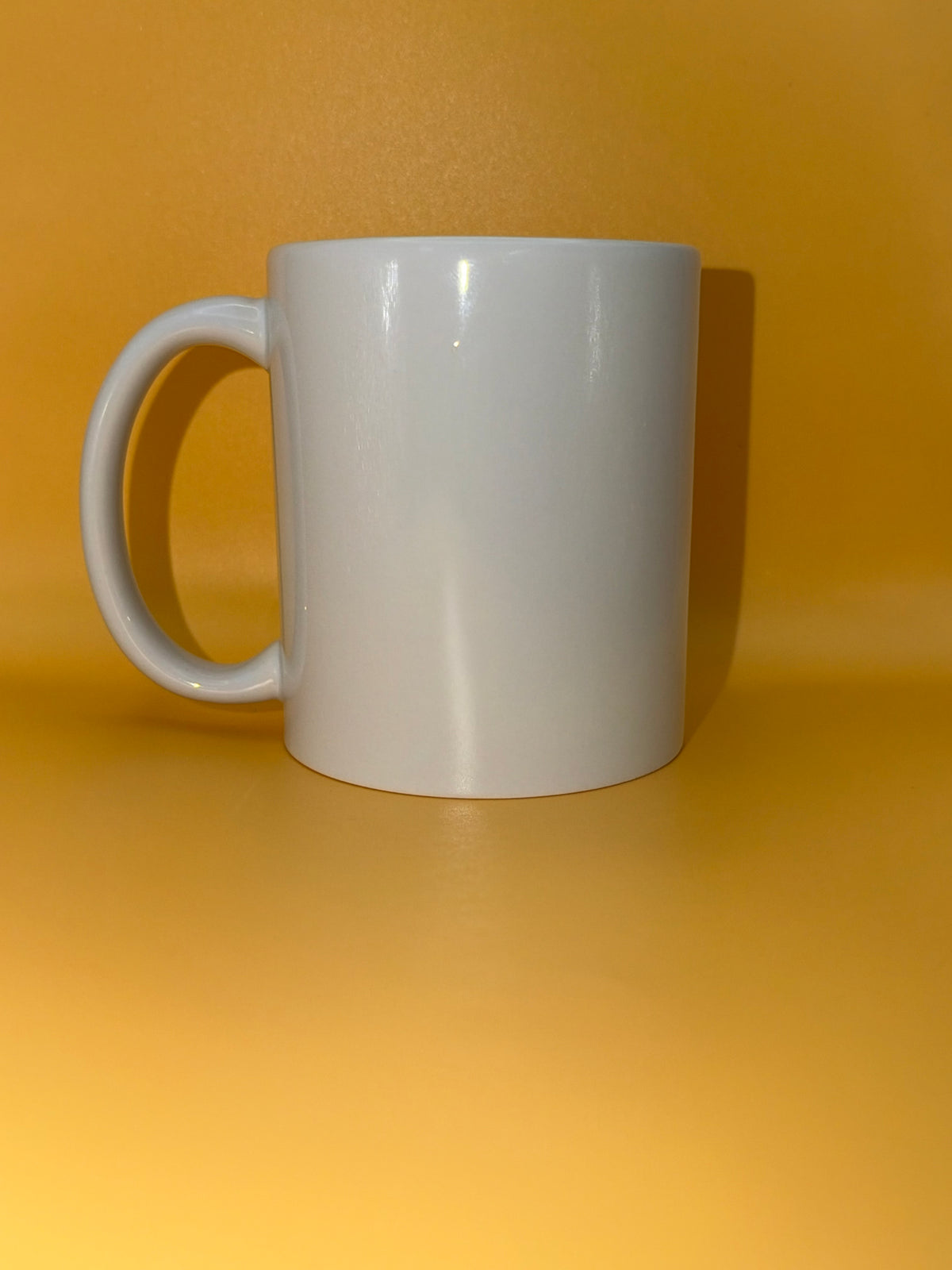 All-white mug shown from the side