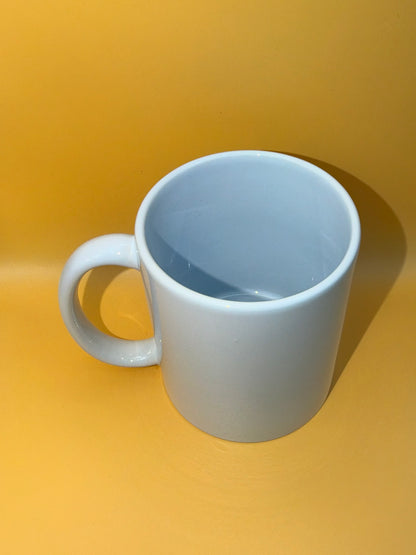 Light blue mug showing the coloured interior and handle