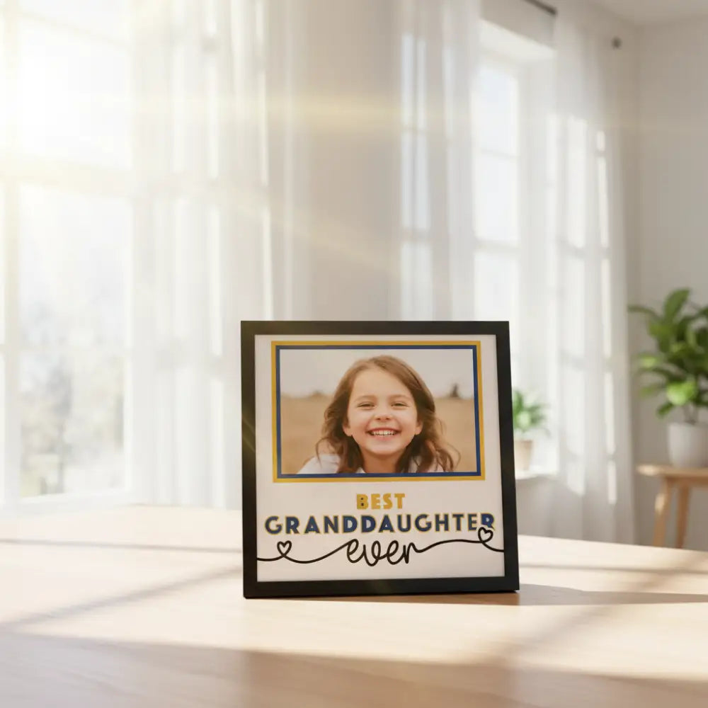 Decorative sign with 'Best Granddaughter Ever' text and a photo frame on a white background.