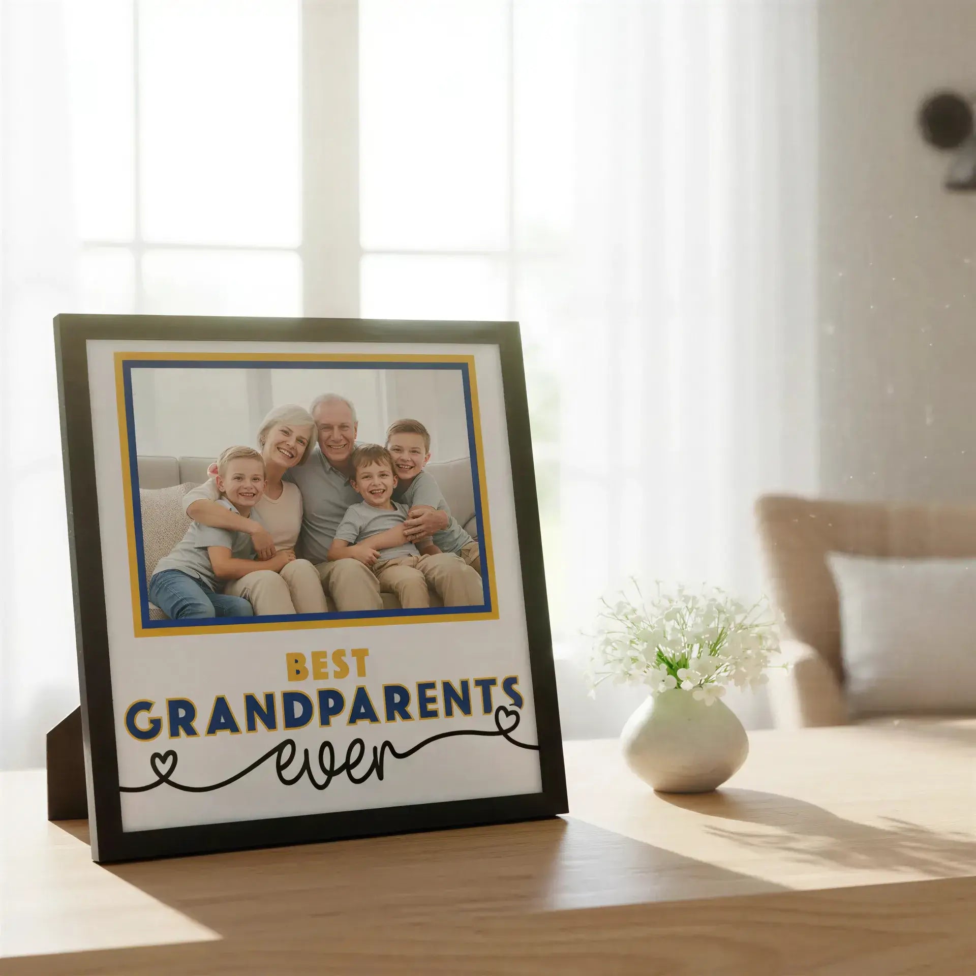 Decorative sign with 'Best Grandparents Ever' text and a gold border on a white background.