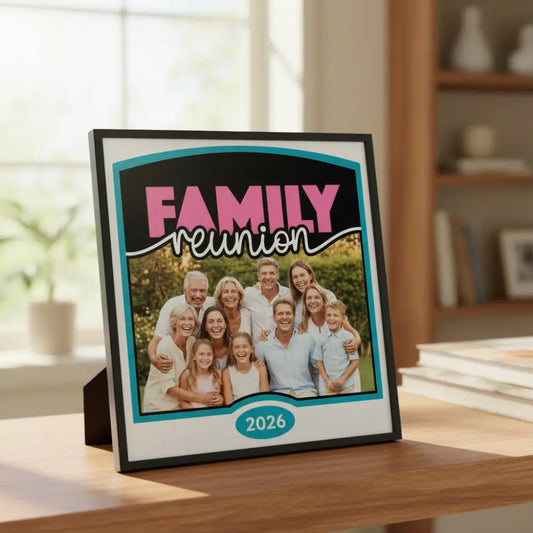 Decorative cutout with 'FAMILY reunion' text in pink and white on a black background