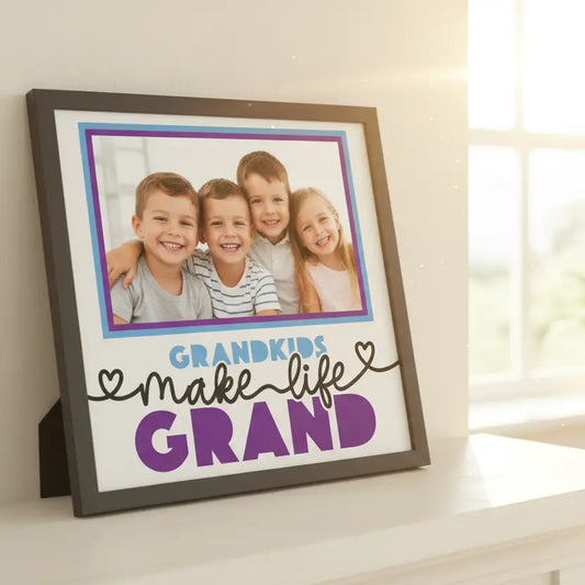 Decorative text poster with 'Grandkids make life grand' quote on a white background