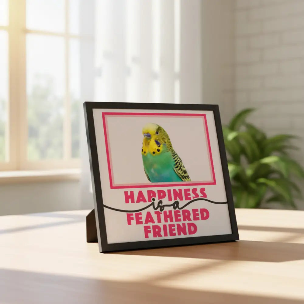 Framed quote 'Happiness is a feathered friend' with pink text on a white background