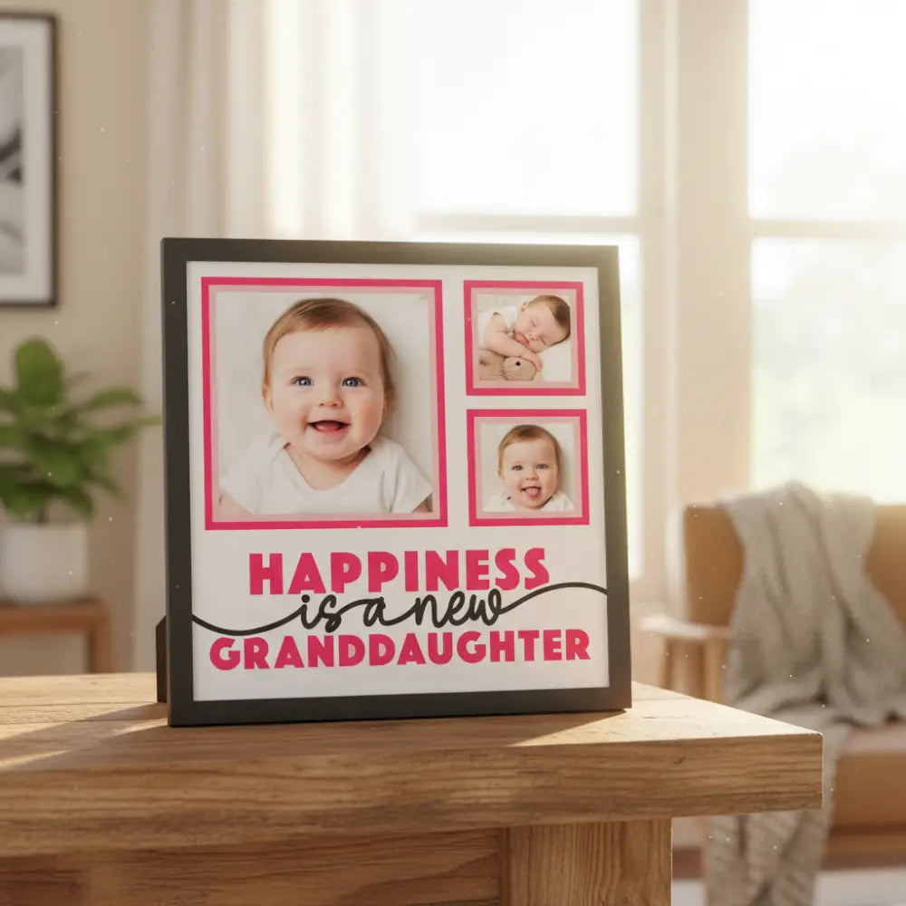 Decorative paper with pink borders and text 'Happiness is a new granddaughter' on a white background.