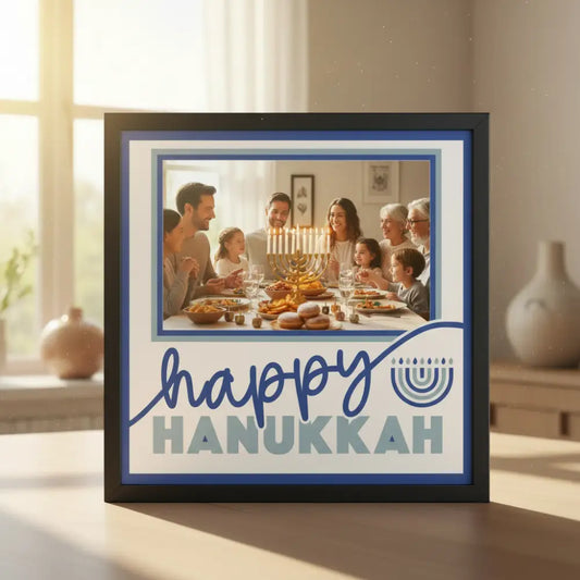 Happy Hanukkah text with a blue frame and menorah symbol on a white background