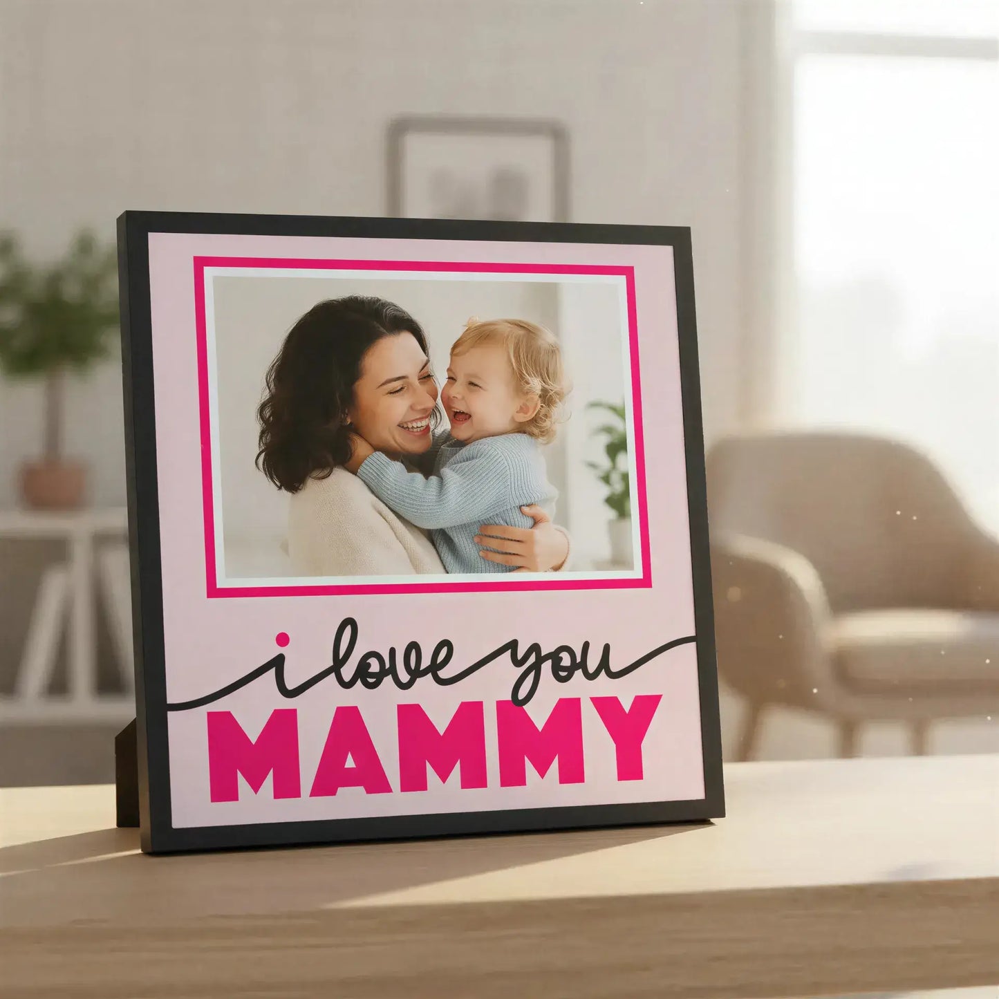 Framed picture with 'I love you MAMMY' text on a pink background