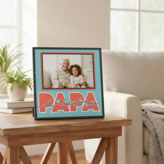 Framed picture with 'PAPA I love you' text on a blue background