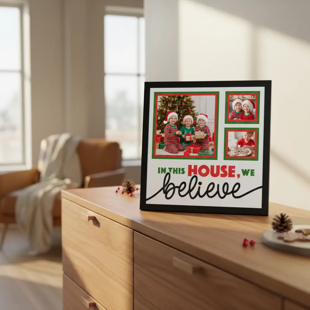 Decorative sign with text 'In this house, we believe' and red and green borders on a white background.