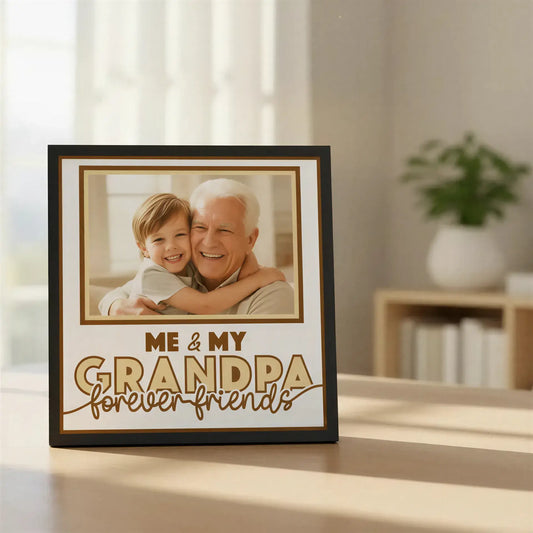 Decorative frame with text 'Me & My Grandpa forever friends' on a white background