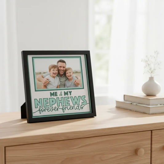 Text 'Me & My Nephews forever friends' with a green square in the center on a light blue border.