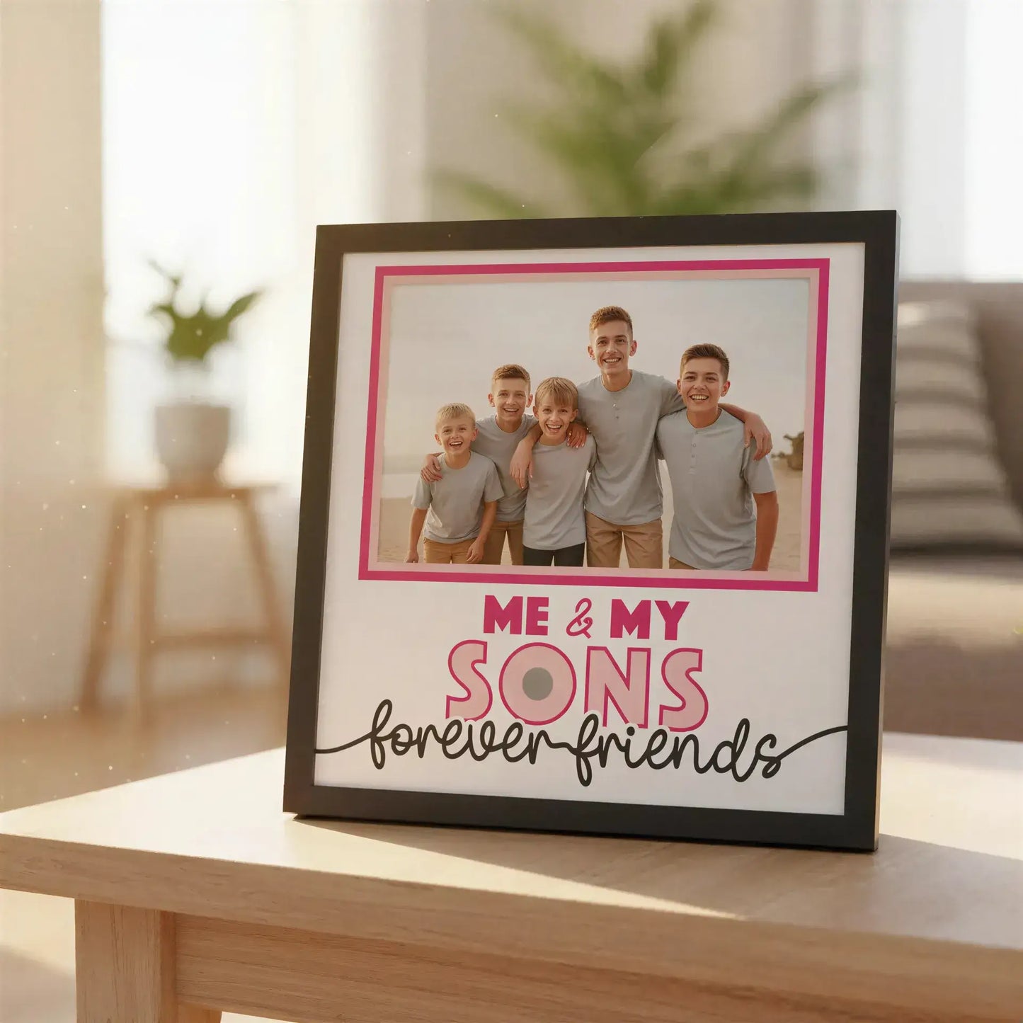 Decorative photo frame with text 'Me & My Sons Forever Friends' on a white background
