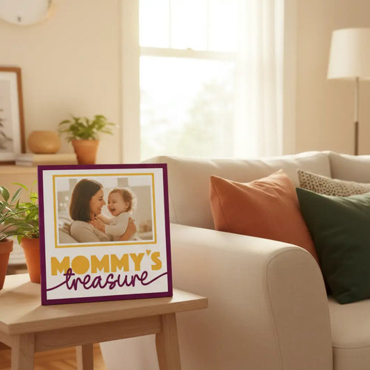 Decorative design with 'Mommy's treasure' text and a gold frame on a white background
