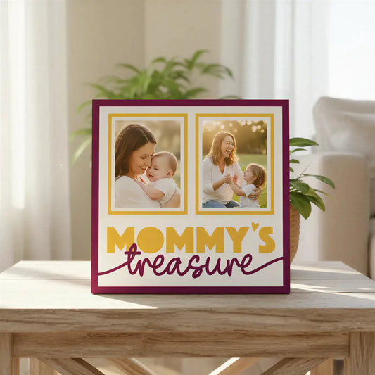 Decorative design with 'Mommy's Treasure' text and gold frames on a white background