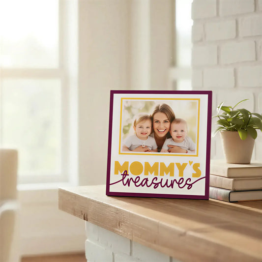 Decorative sign with 'Mommy's Treasures' text and gold frame on a white background