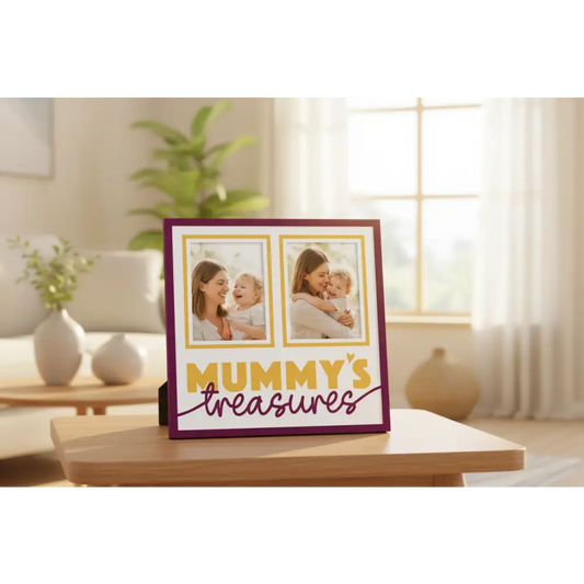 Decorative sign with 'Mummy's Treasures' text and two empty frames on a white background.