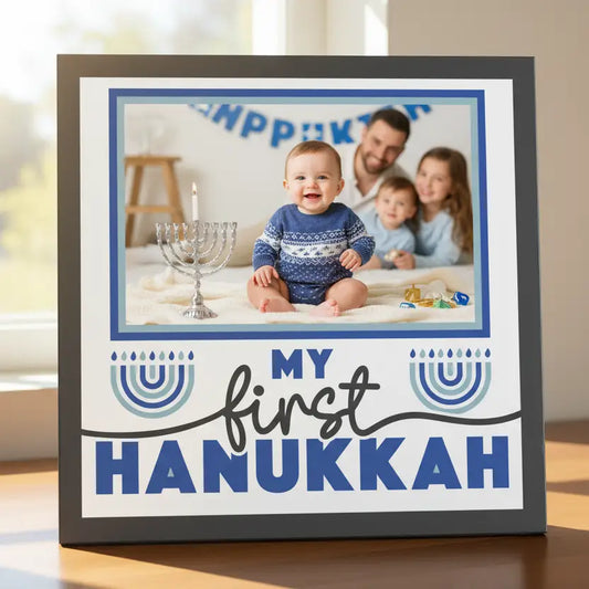 Framed photo album page with 'My First Hanukkah' text and menorah symbols.