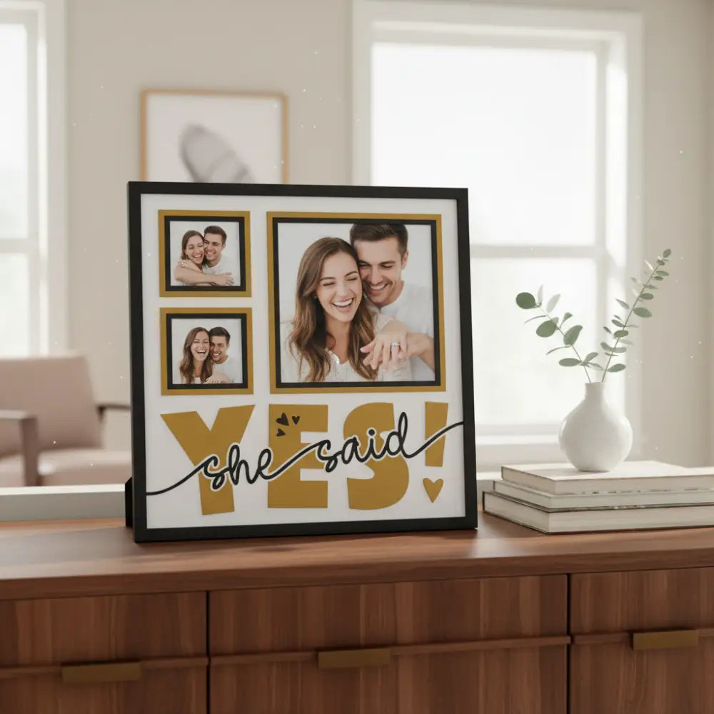Decorative collage with 'she said yes!' text and gold frames on a white background