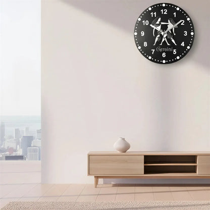 Decorative slate clock face with Gemini zodiac sign design on a black background
