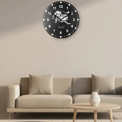 Circular slate clock face with a Leo zodiac symbol on a black background