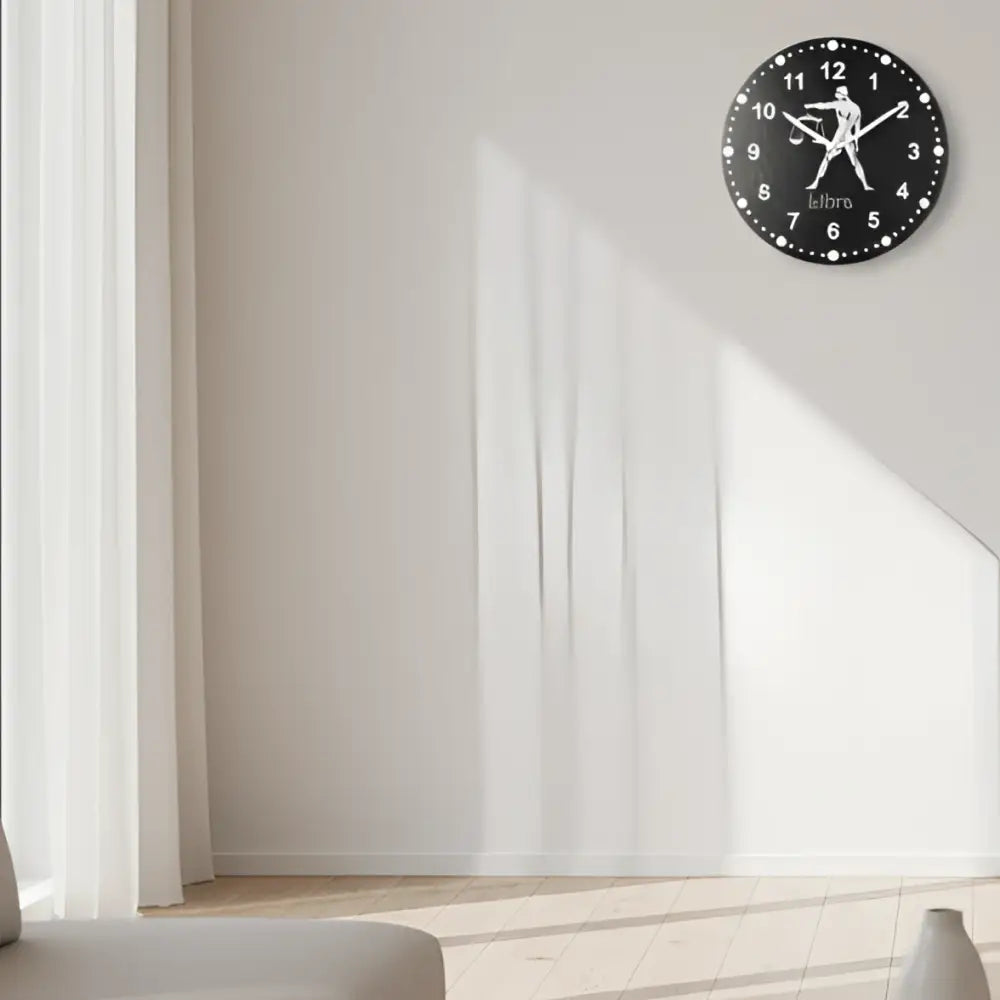 Slate Clock face with Libra zodiac sign symbol on a black background