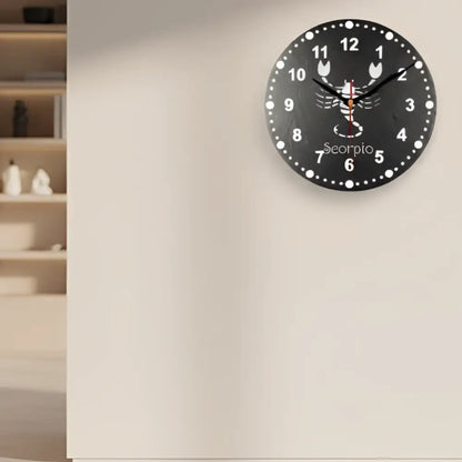 Decorative slate clock face with Scorpio zodiac symbol on a black background