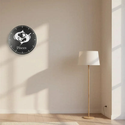 Pisces zodiac sign symbol on a black slate background
