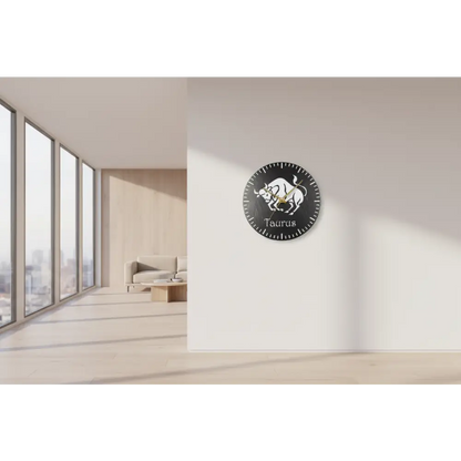 Wall clock with Taurus design on a wall in a modern room with large windows.