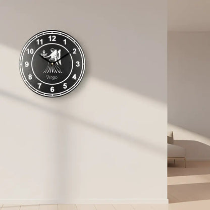 Clock face with Virgo zodiac sign illustration on a black slate background