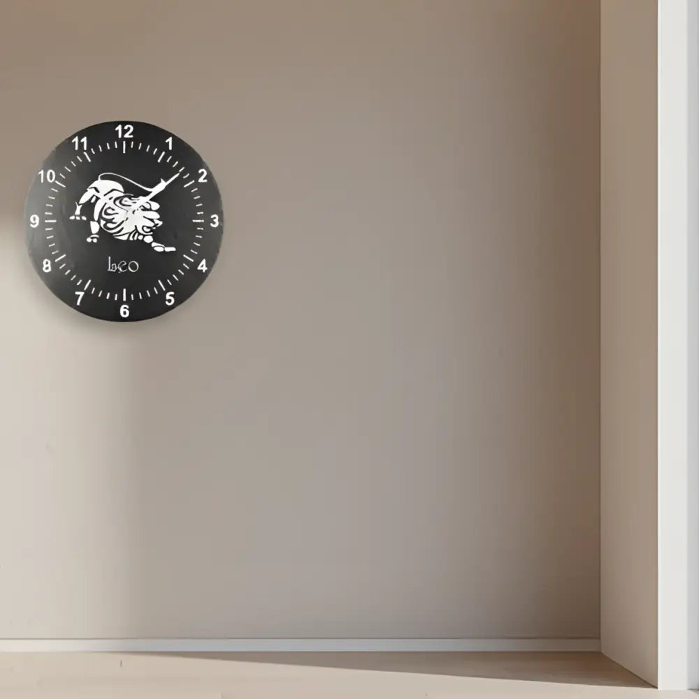 Slate clock face with a Leo zodiac symbol