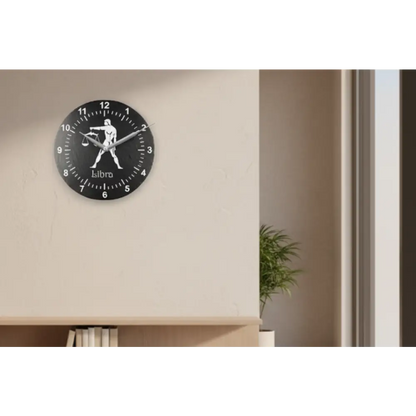 Decorative slate clock face with Libra zodiac symbol on a black background