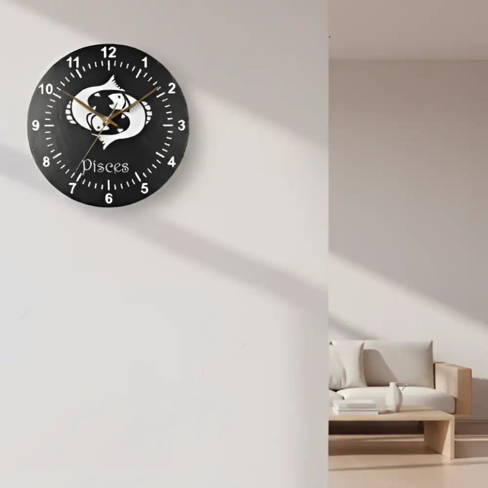 Decorative slate clock with Pisces symbol and number labels on a grid background