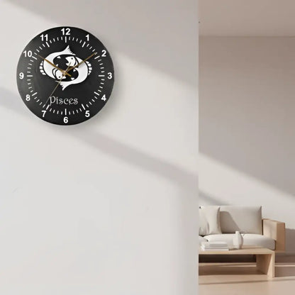 Decorative slate clock with Pisces symbol and number labels on a grid background
