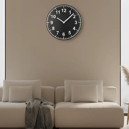slate Clock face with white numbers on a black background