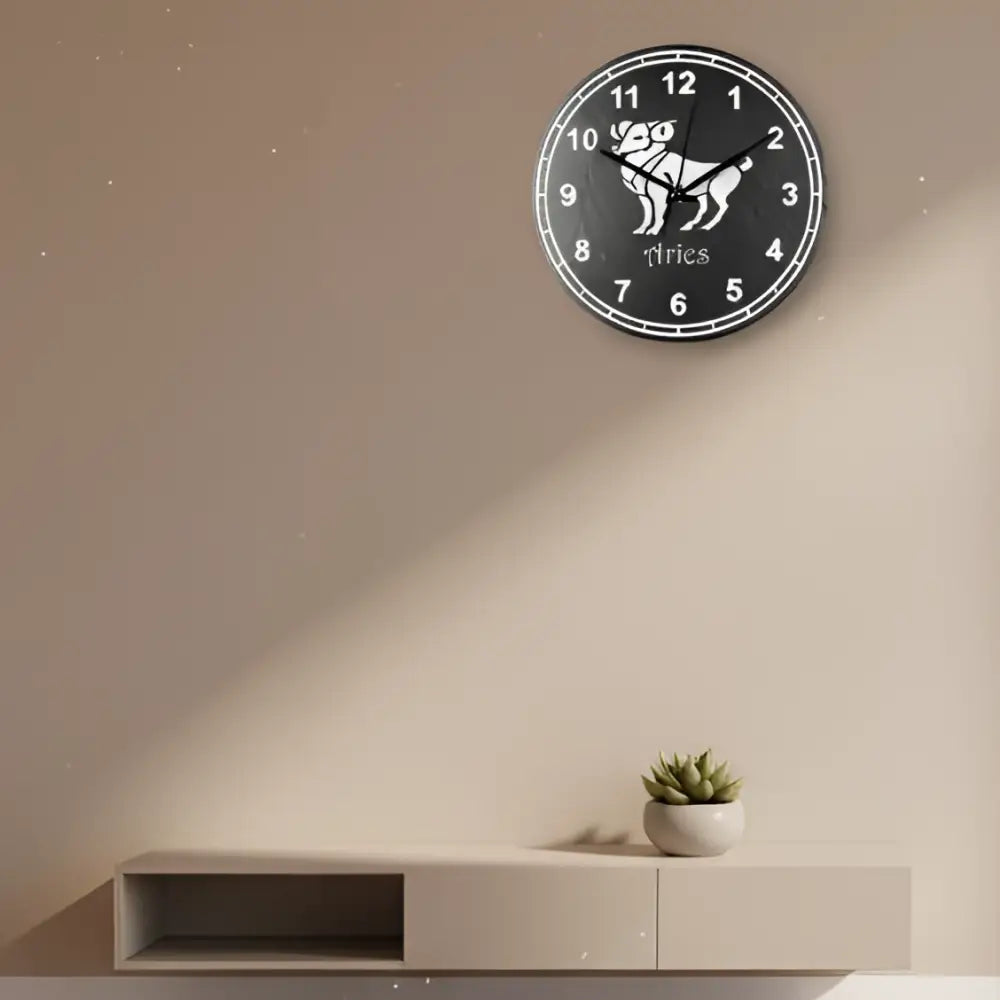 Slate Clock face with Aries zodiac sign and numbers on a dark background