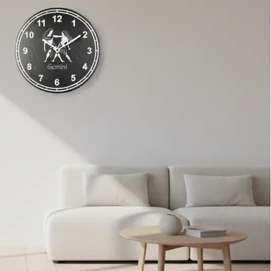 slate Clock face with Gemini zodiac sign design on a black background