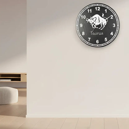 Slate Clock face with Taurus zodiac sign and numbers on a dark background