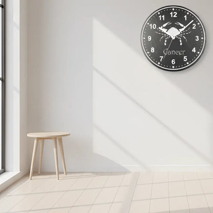Slate clock with Cancer zodiac symbol on a dark background