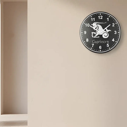 Capricorn zodiac sign slate clock with numbers and star design on a dark background