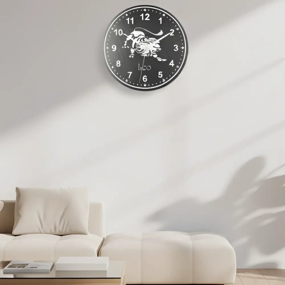 Decorative slate clock with a lion design and 'Leo' text on a black background