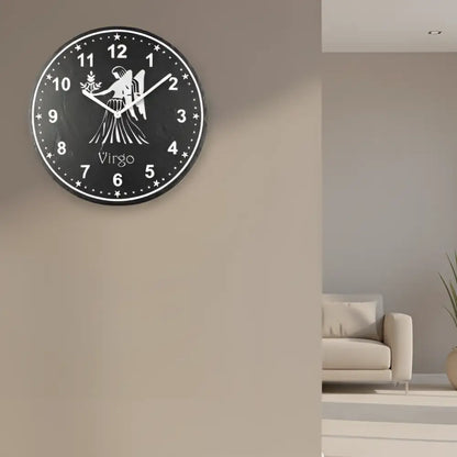 Decorative slate clock face with Virgo zodiac sign design on a black background