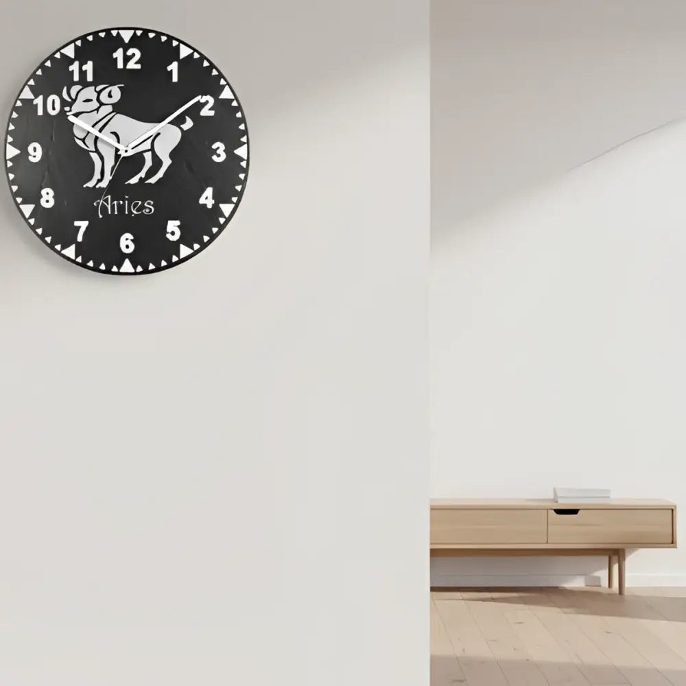 Clock face with Aries zodiac symbol and numbers on a dark background
