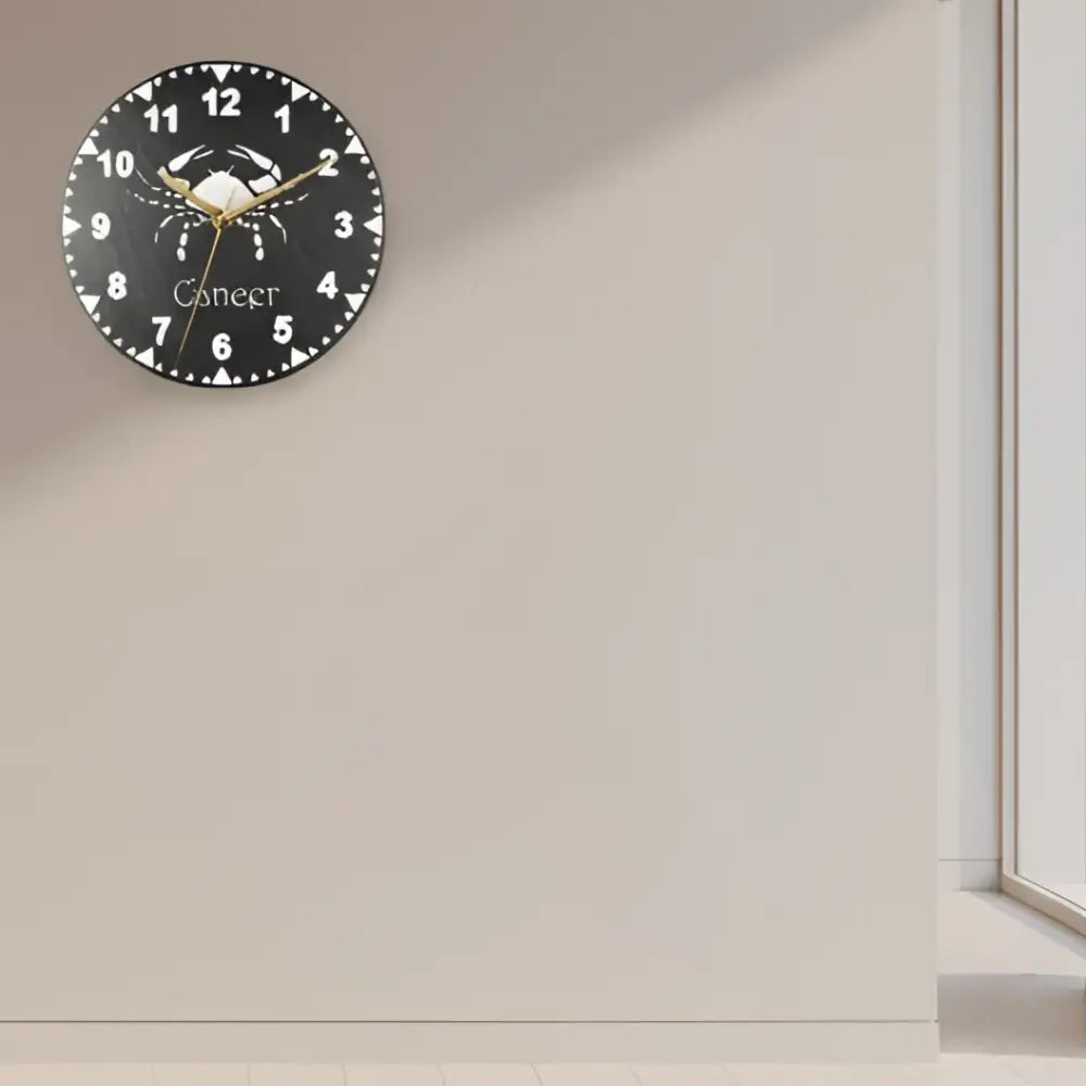 Slate clock face with a crab design and 'Cancer' text on a black background