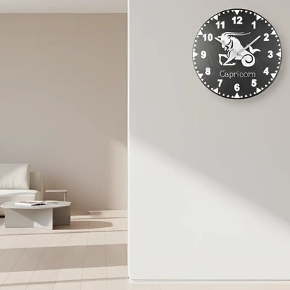 Slate clock face with Capricorn zodiac symbol and numbers on a grid background