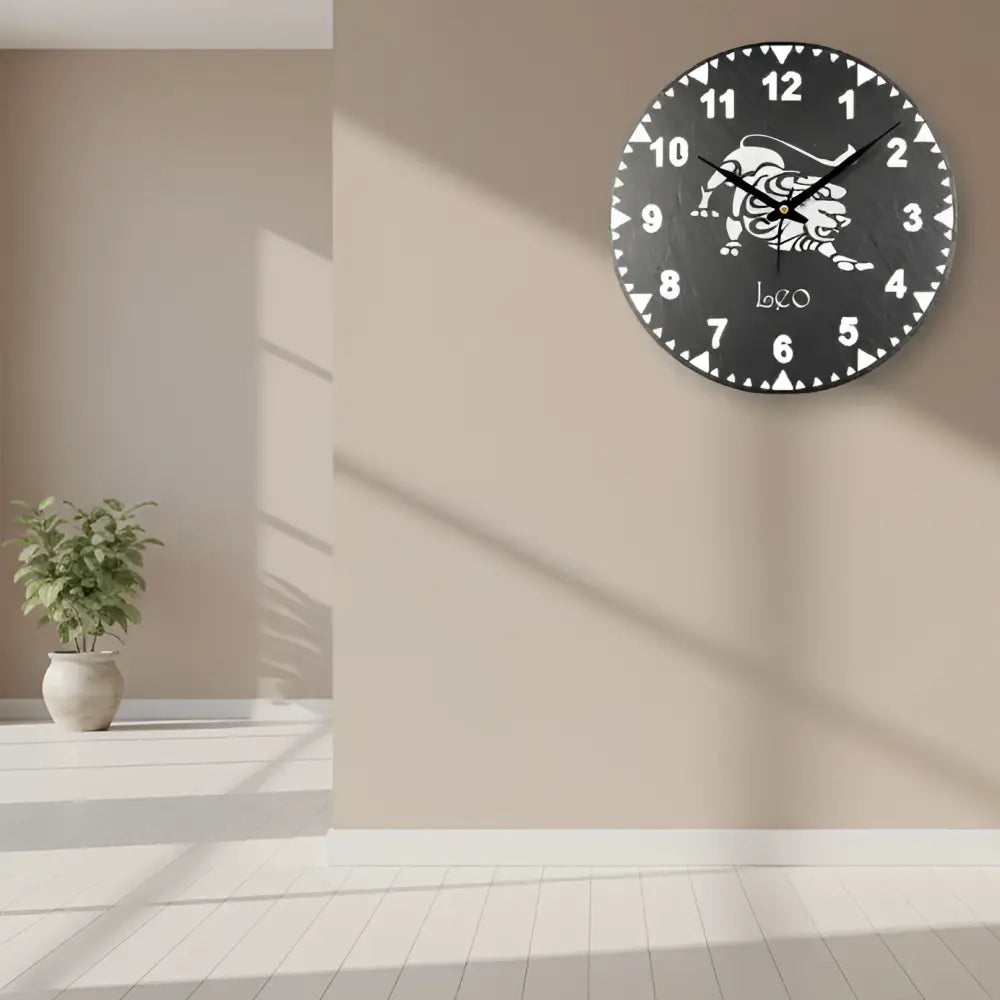 Slate clock face with Leo zodiac sign design on a black background