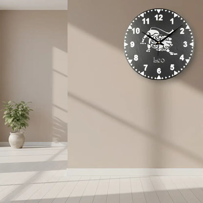 Slate clock face with Leo zodiac sign design on a black background